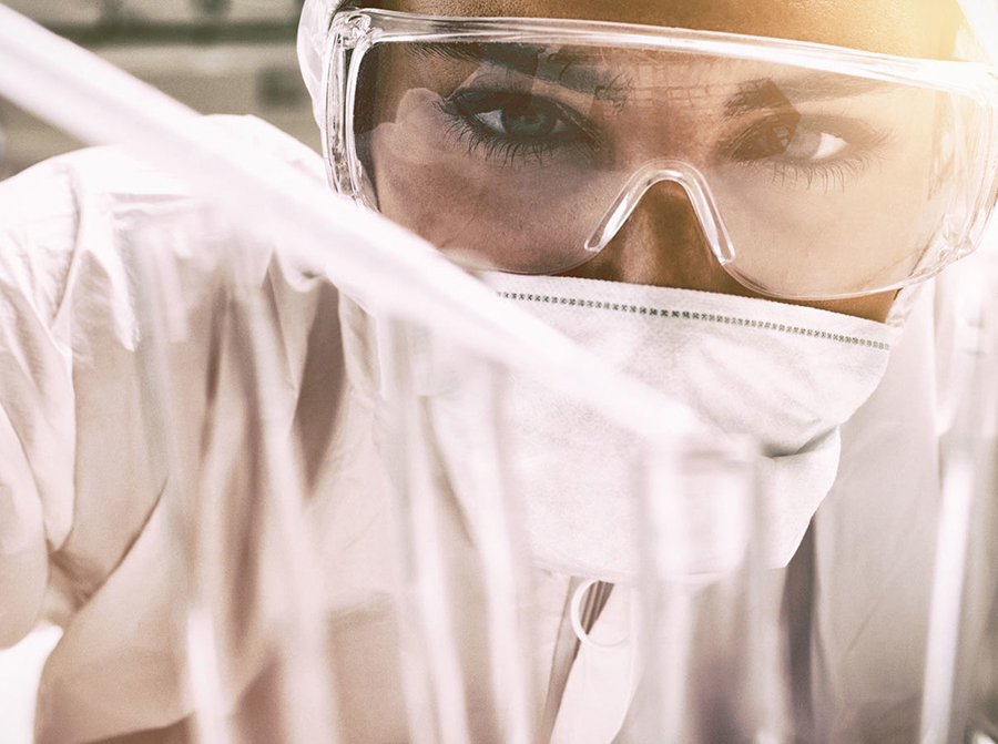 Person Working as an Apprentice in a Lab