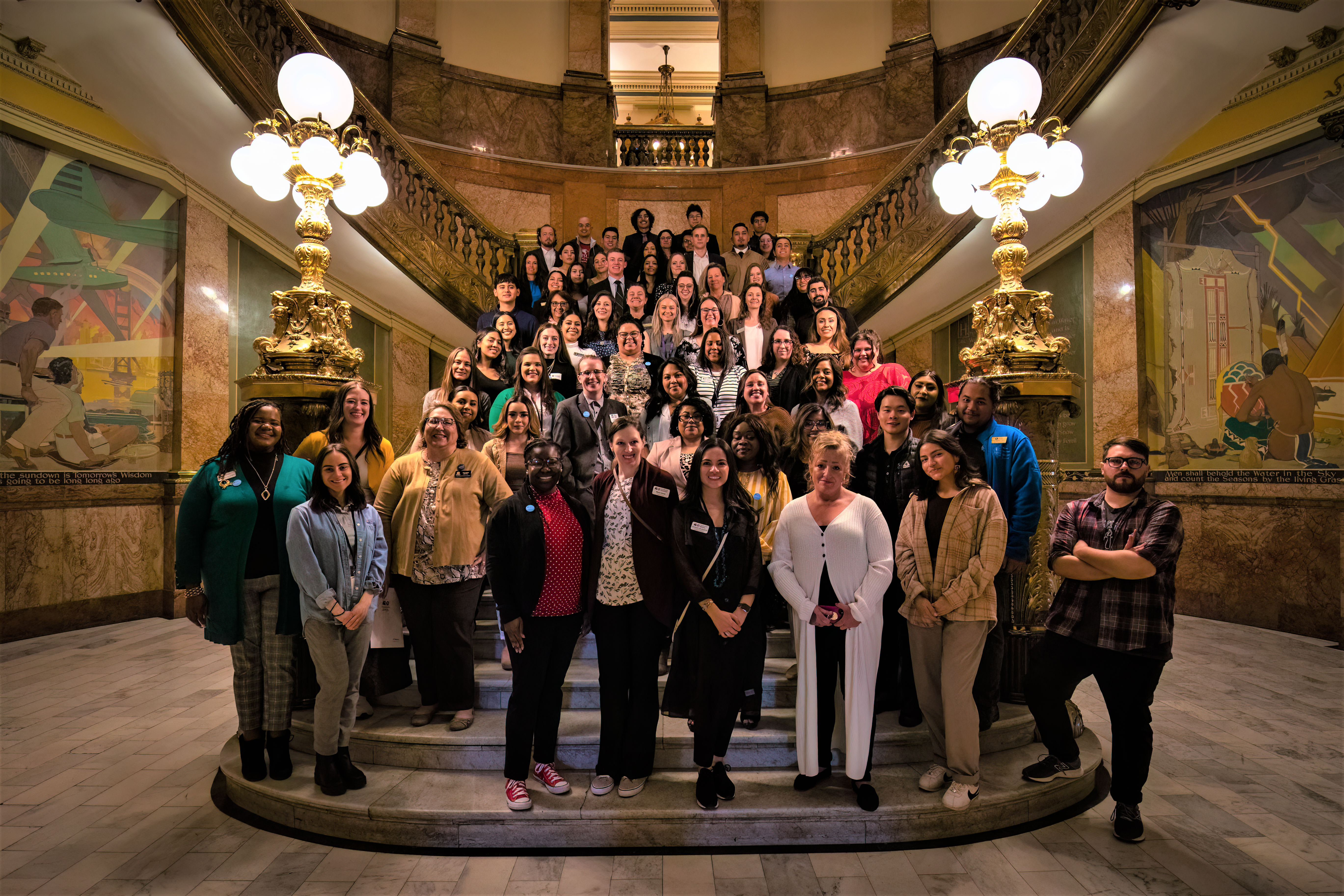 Group of 100 COSI stakeholders fill the stairs at the Colorado State Capitol